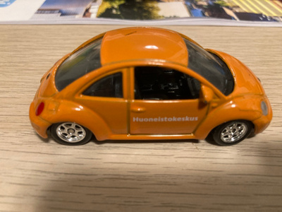 VW Kupla New Beetle 1/64 Welly pikkuauto.