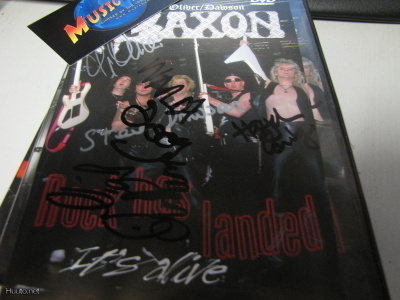 OLIVER / DAWSON SAXON - ROCK HAS LANDED DVD VIHKO + NIMMARIT