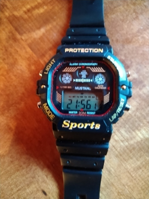 PROTECTION Sports Kello ajanotolla.