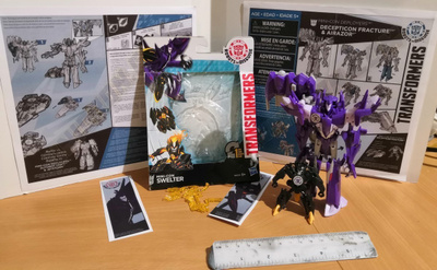 Fracture decepticoni ja Swelter miniconi Transformers RID