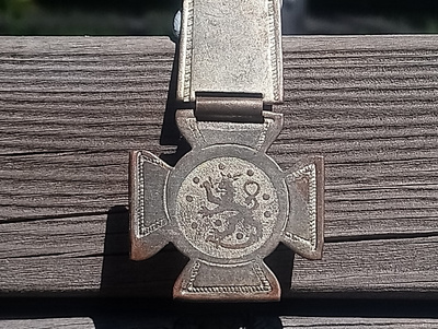 Sodanaikainen Leijona Kellonperä. Pituus - 830 mm.