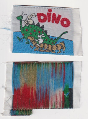 Dino - kangasmerkki
