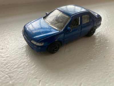 Toyota Corolla -97 1/64 Motormax pikkuauto.