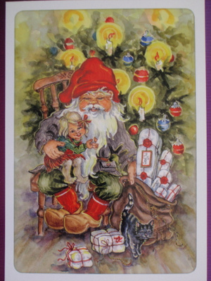 Ingrid Elf tyttö istuu pukin sylissä