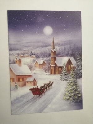 Joulupukki ajaa reellä