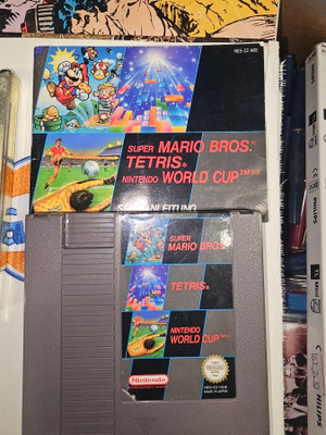 Super Mario bros, tetris ja Nintendo world Cup ohjekirja
