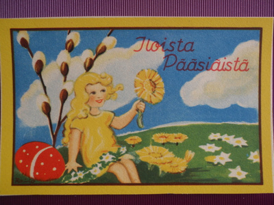 Etel Raivio tytöllä leskenlehti kädessä