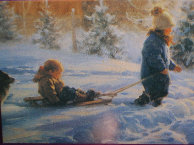 Tyttö vetää pikkuveljeä kelkassa, koira seuraa