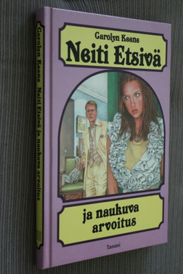 Carolyn Keene : Neiti Etsivä ja naukuva arvoitus (1.p. 1994)