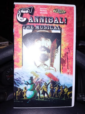 VHS : CANNIBAL THE MUSICAL ( TROMA) UUSI