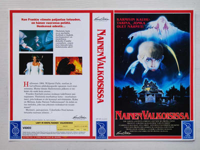 VHS Nainen valkoisissa –kansipaperi