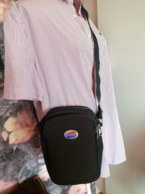 American Tourister miesten olkalaukku
