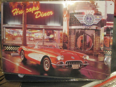 Peltikyltti Hubcaps Diner. Chevrolet Corvette