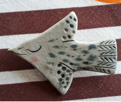 Erikoinen rintaneula