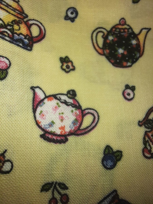tilkkutyökangas 112x50cm , teepannuja