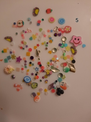 Askarteluun koristeita setit 5-8