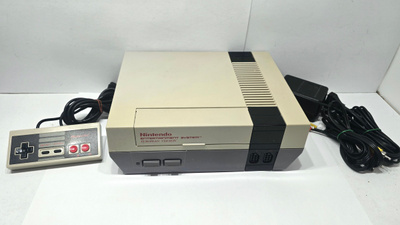 NES konsoli + ohjain [2]