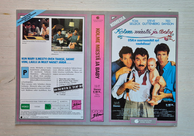 VHS Kolme miestä ja baby -kansipaperi