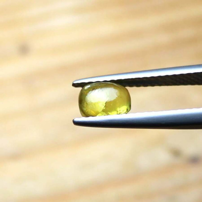 Pallasiittinen peridootti 1.06 ct pyörtöhionta GIA todistus