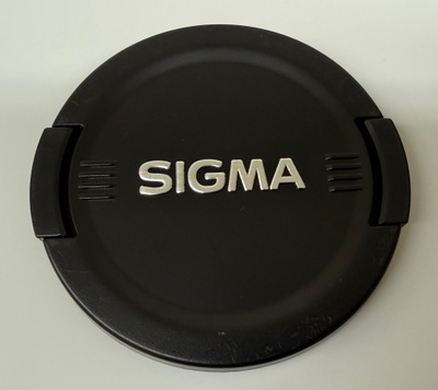 Käytetty Sigma 62mm linssisuojus, hopea logo