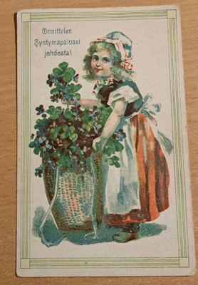tytöllä kukkia ruukussa, kulkenut 1909