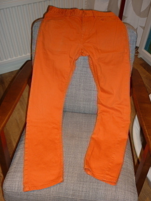 Oranssit farkut kokoa 158cm