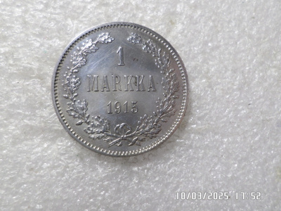 1 mk 1915 hopeaa S- kaukana jalasta, Kulkematon.