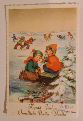 lapset luistelemassa, käsipostia
