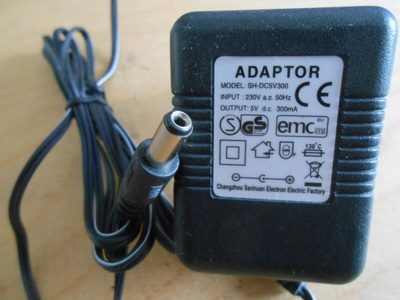 Power Adaptor Model SH-DC5V300 5V DC 300mA.