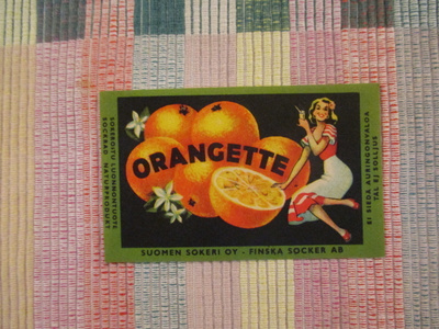 Orangette juomaetiketti .Suomen Sokeri Oy.
