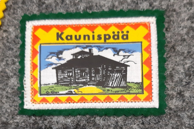 Kaunispää kangasmerkki
