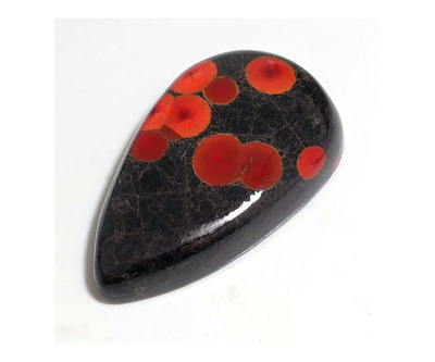Vulkaaninen lasi 32.25 ct oranssi maasälpä sulkeumilla MEX