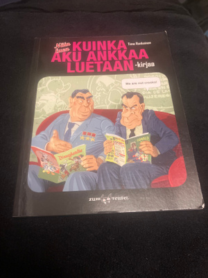 Näin luen Kuinka Aku Ankkaa luetaan -kirjaa