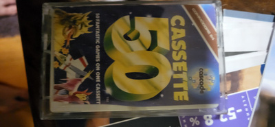 Commodore 64 50 cassette alkuperäisrasiassaan (cib)