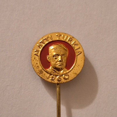 MATTI TURKIA NEULAMERKKI