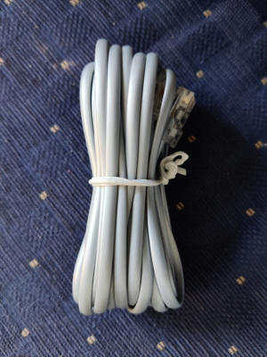 Puhelinkaapeli, noin 4 m, RJ-45/RJ-11