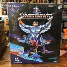 SILVERHAWKS 1000 PIECE ROUND PUZZLE	(27 958)	n.70cm pyöreä p