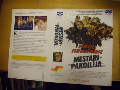 Vhs kansipaperi Fix - MESTARIPAKOILIJA  (Sis.postikulut)