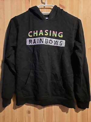 Chasing rainbows huppari isolla taskulla