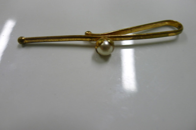 Kullattu solmioneula