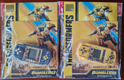 Transformers & Batman käsipelikonsolit + värityskirjat 15e/k