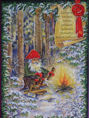 Ingrid Elf tonttu nuotion äärellä