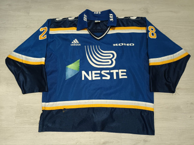 Espoo Bluesin pelipaita SM-liiga 25 vuotta -patchillä