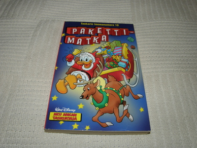 Taskarin teemanumero 10 Pakettimatka