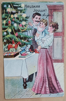 Pieni perhe viettää joulua, pöytäkuusi, lahjoja, p. 1907