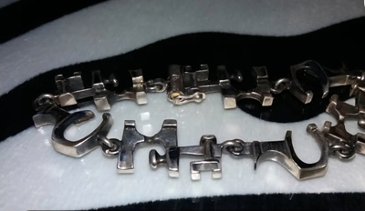 Design, Jorma Laine, rannekoru, Hopeaa. Turku  830
