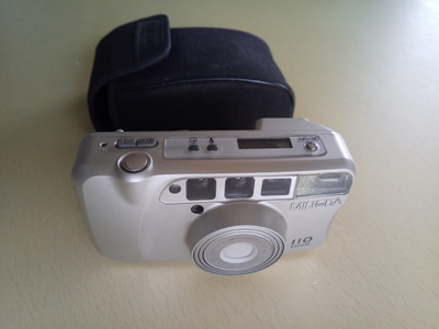 Minolta 110 zoom (viallinen)