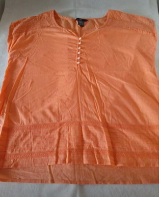 Oranssi hihaton paita koko 38