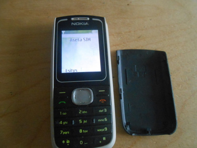 Nokia 1650 + akku ja laturi, toimii.