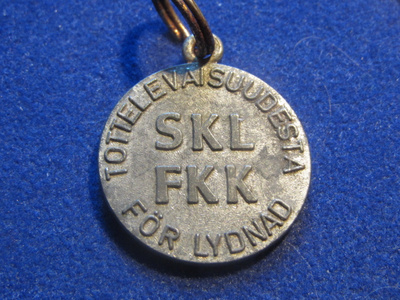 Tottelevaisuusmitali. Suomen Kennelliitto